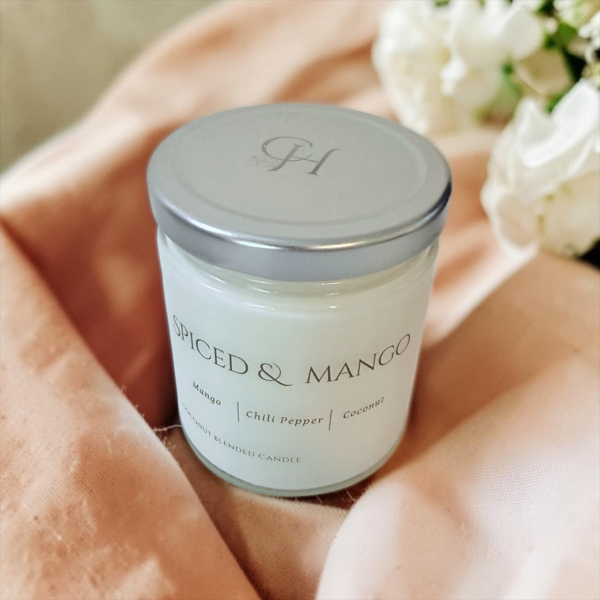 Spiced & Mango candle from The Wrapped Collection by Charmed Harvest, view 2