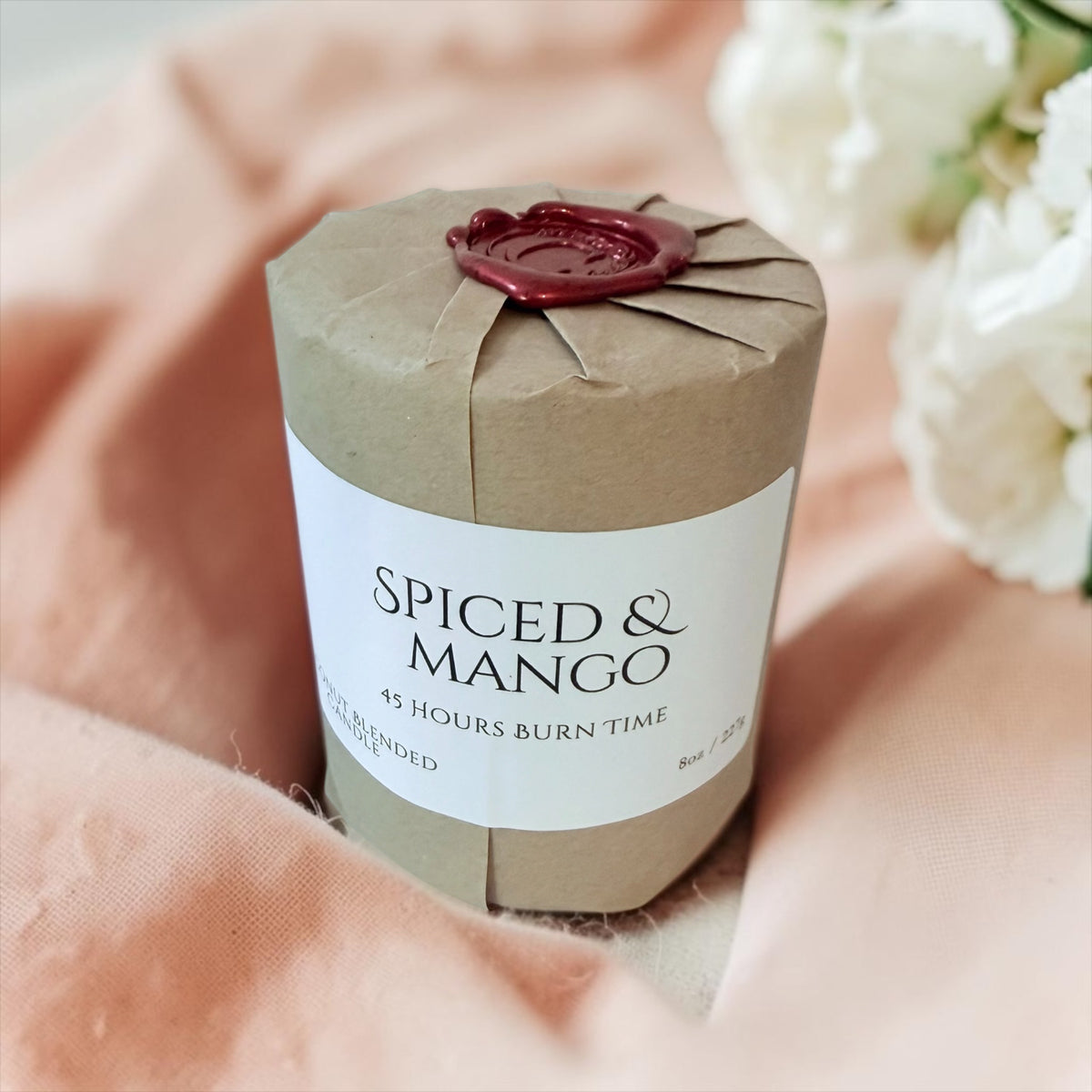 Spiced & Mango candle from The Wrapped Collection by Charmed Harvest, view 5